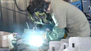 person welding